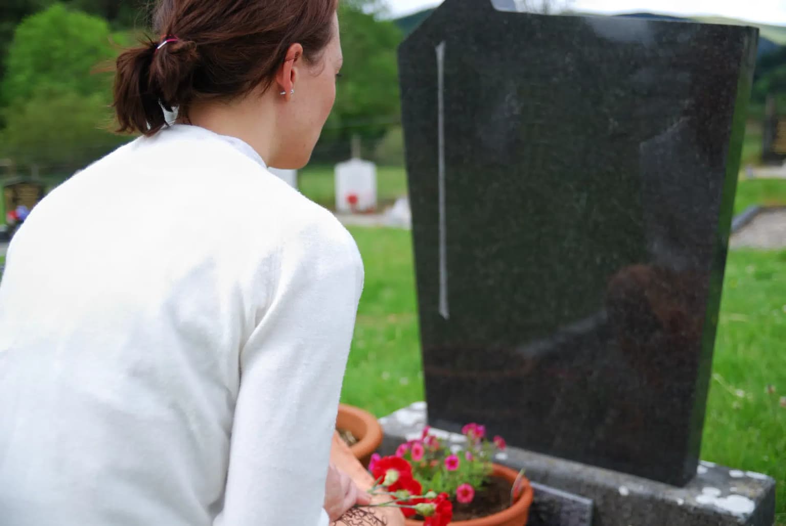 Black granite upright headstone